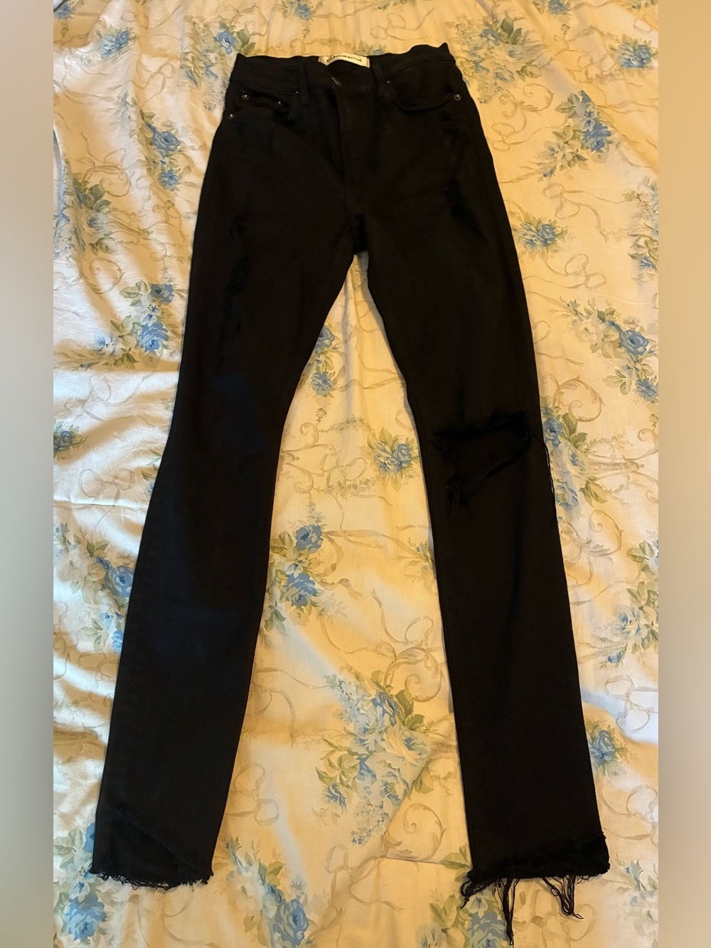 Reformation Black Skinny Jeans with Knee Distress